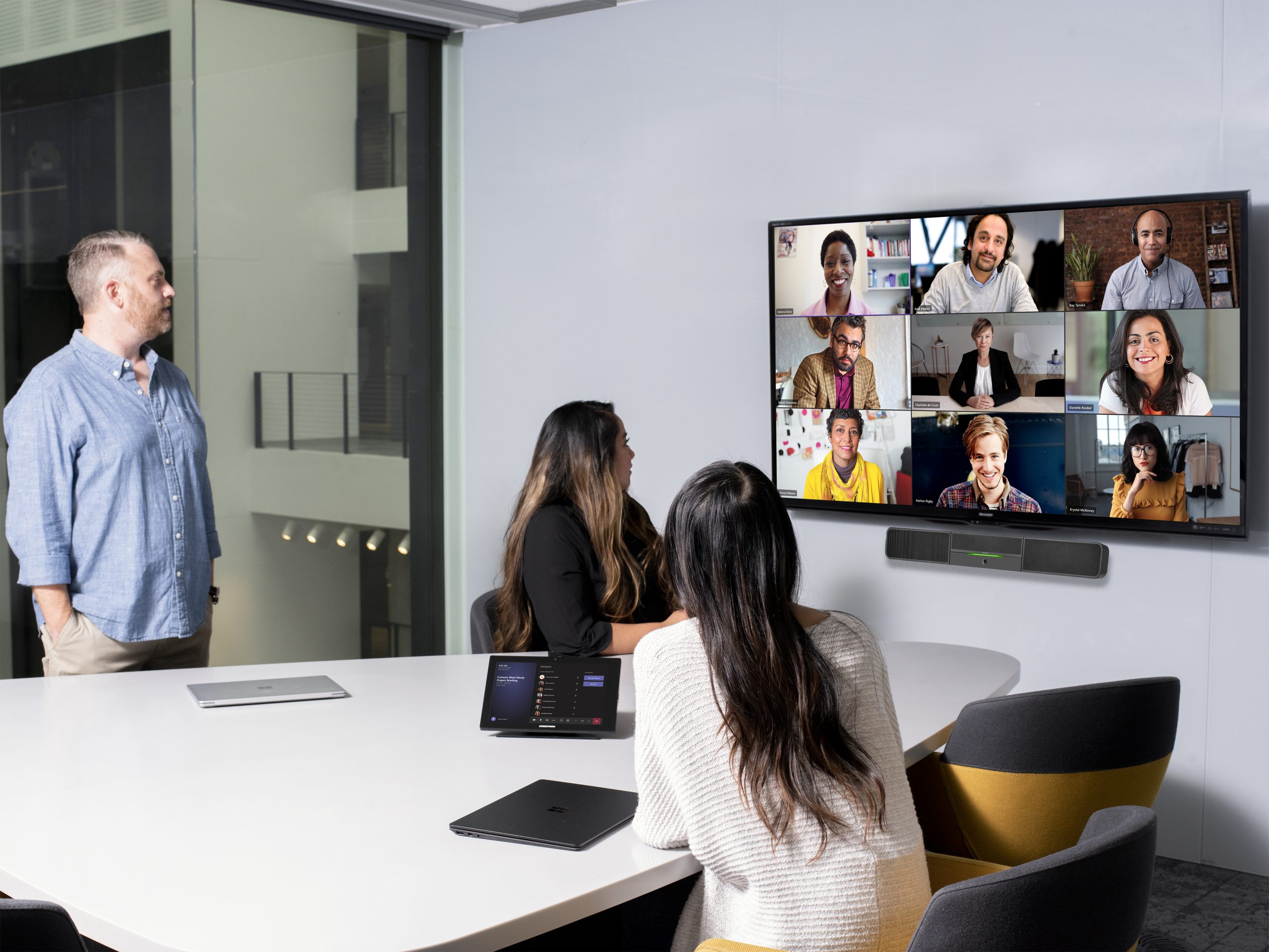 Remote and in person employee meeting