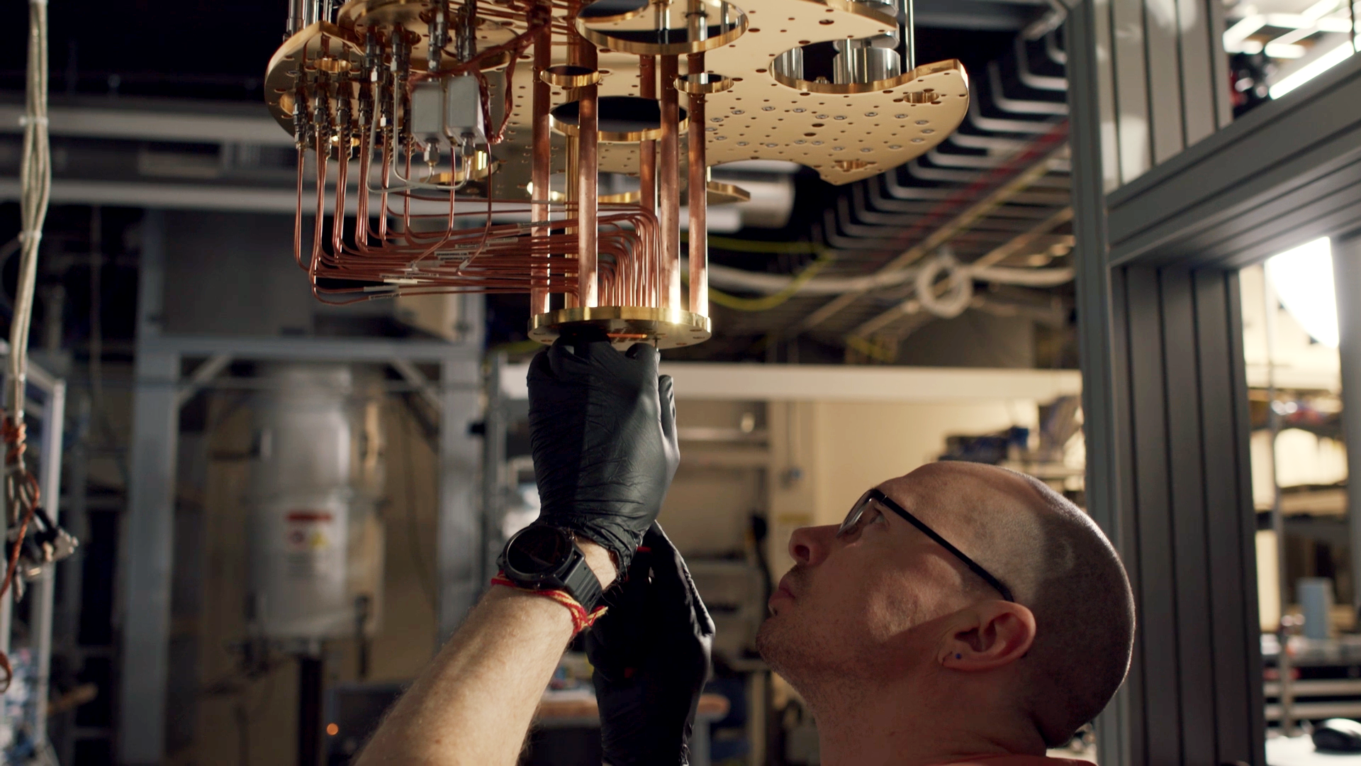 man working on the inside of large computer