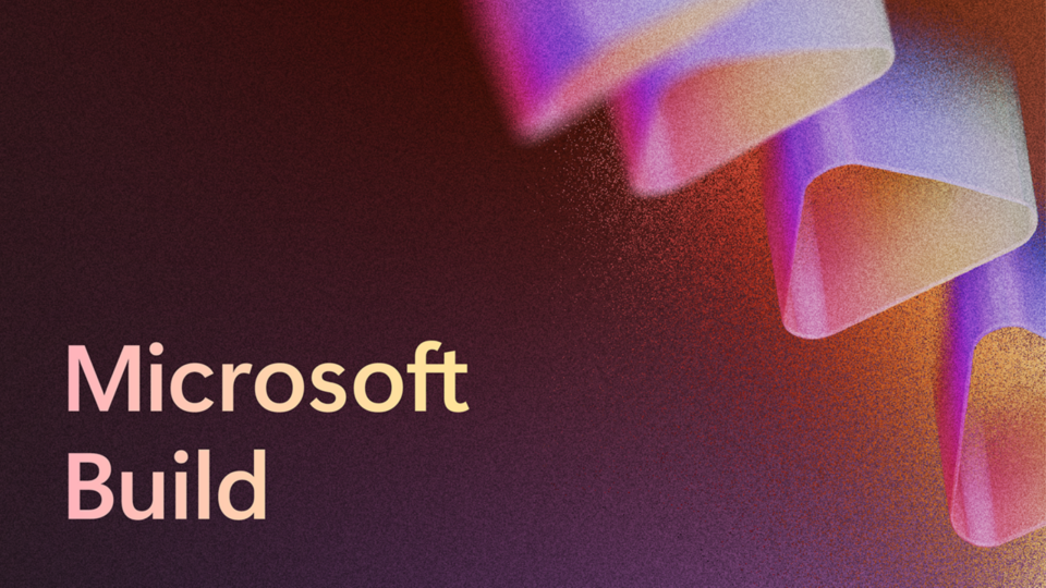 An image with Microsoft Build in the lower left corner, a dark red background that becomes pixelated and lighter toward the right side and images of triangular tubes on the right side.
