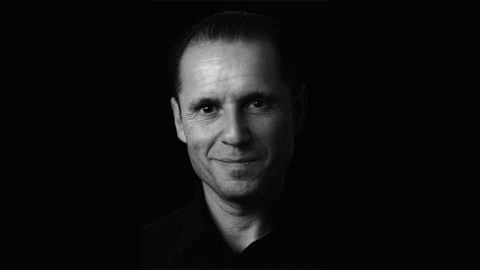 Black and white photo of Rubén Caballero