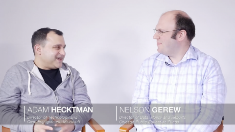 Adam Hecktman (left) sits with Nelson Gerew (right)