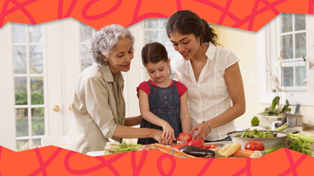 Multi-generational Hispanic family cooking in kitchen