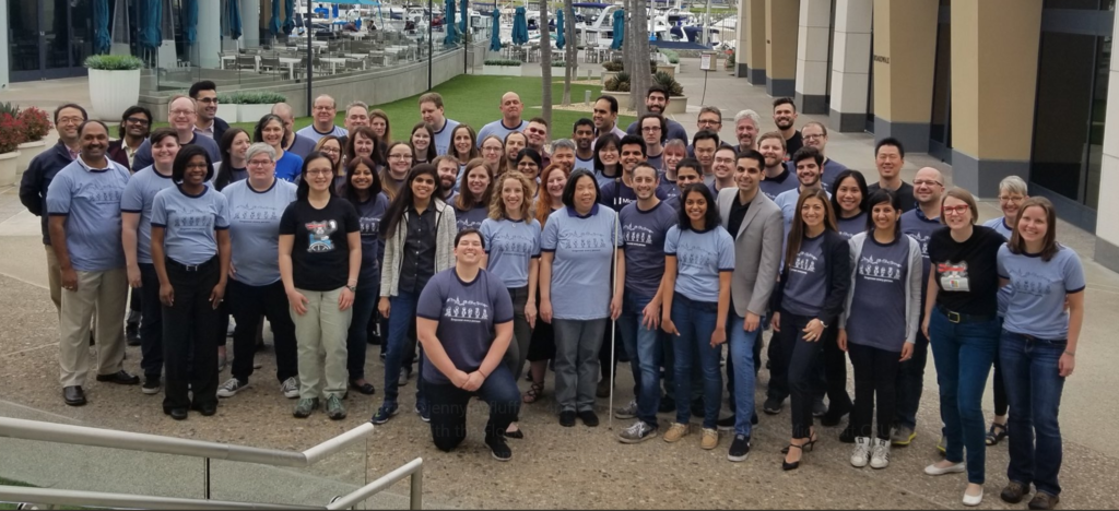 A group of people wearing blue Microsoft accessibility T-shirts at CSUN