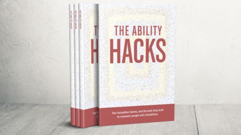 A stack of books on a table that say "The Ability Hacks"