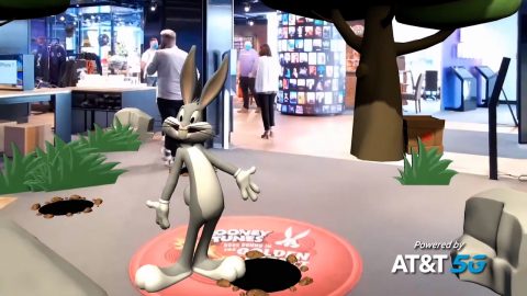 A mobile device displays Bugs Bunny. LOONEY TUNES and all related characters and elements © & ™ Warner Bros. Entertainment Inc. (s21)
