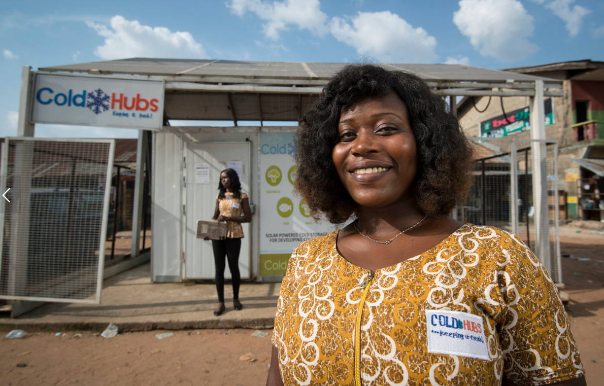 Woman outside of a ColdHubs station