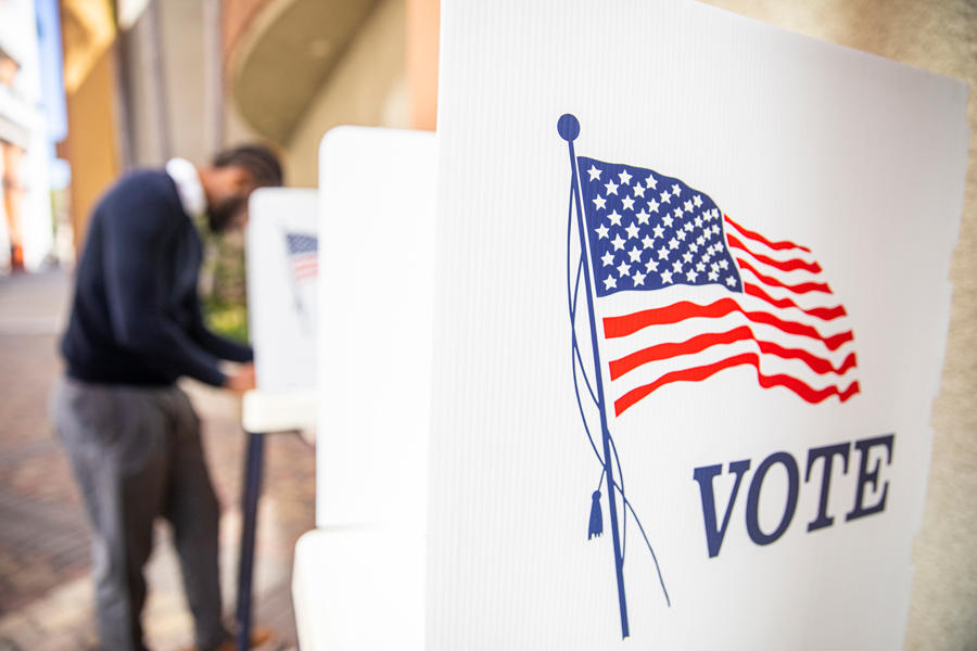 a person at a voting booth