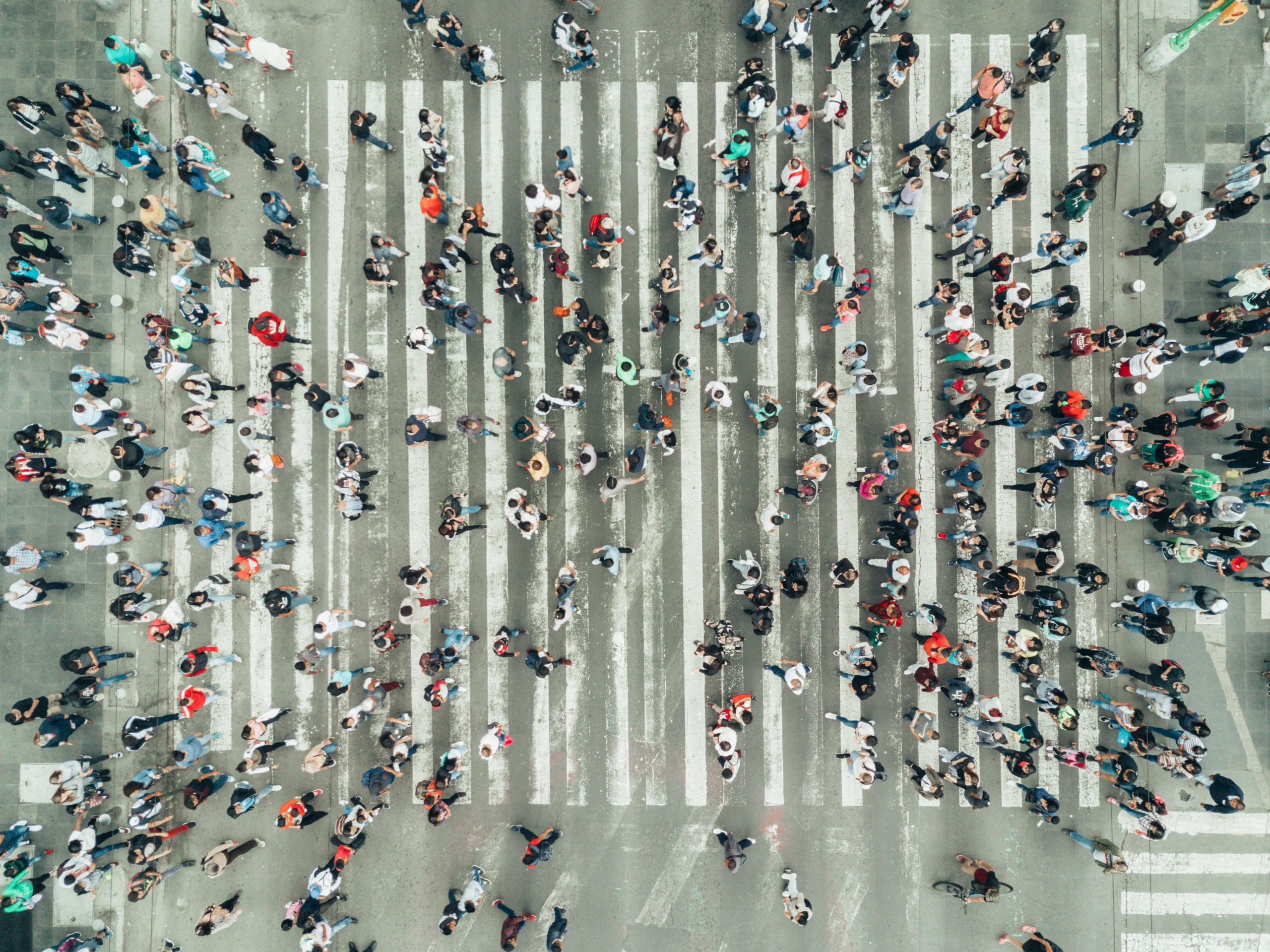 an abstract image of a crowd viewed from above