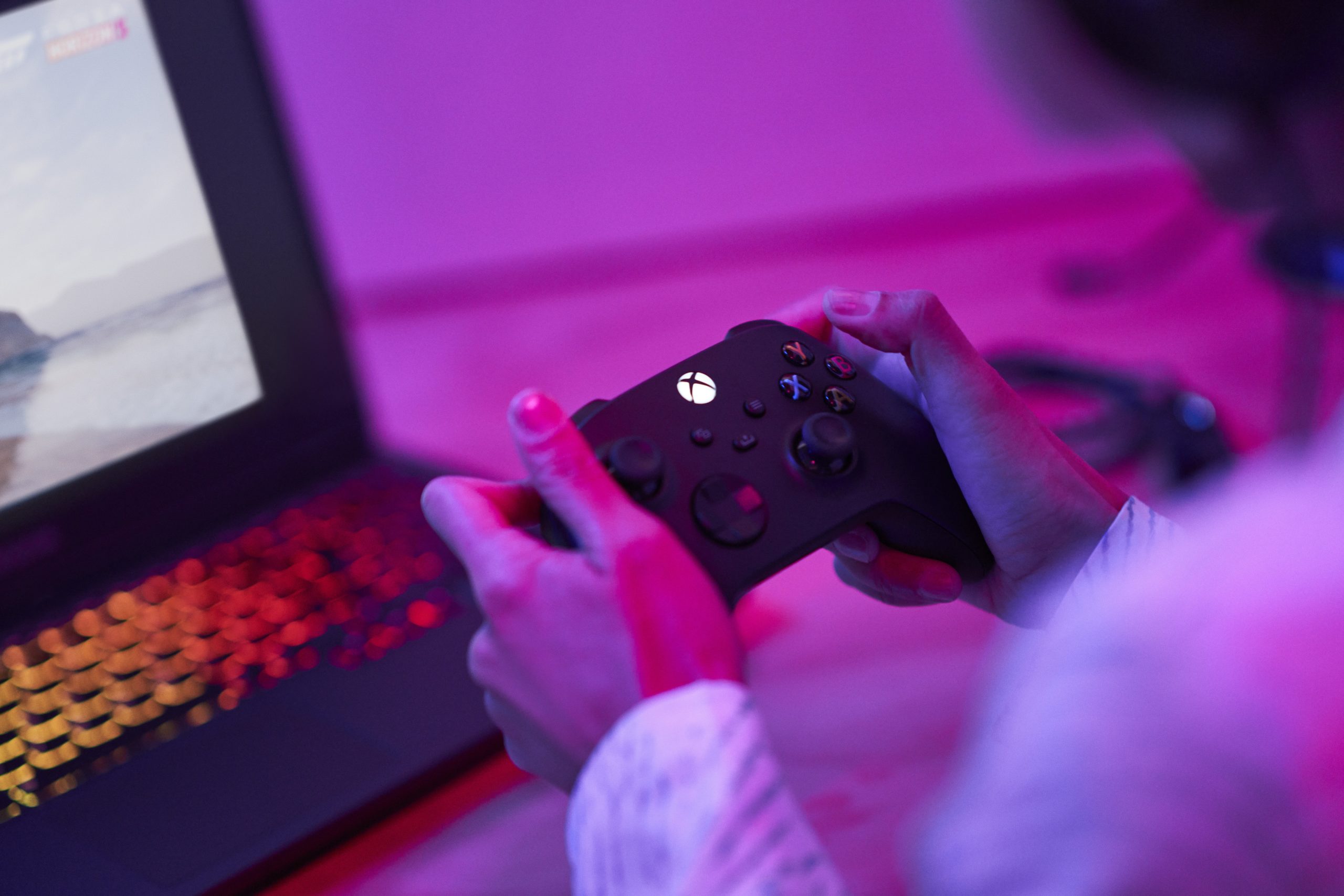 person holding xbox controller