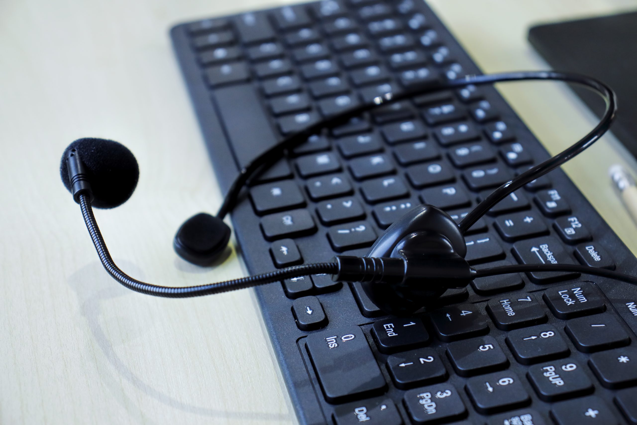 headset on computer keyboard