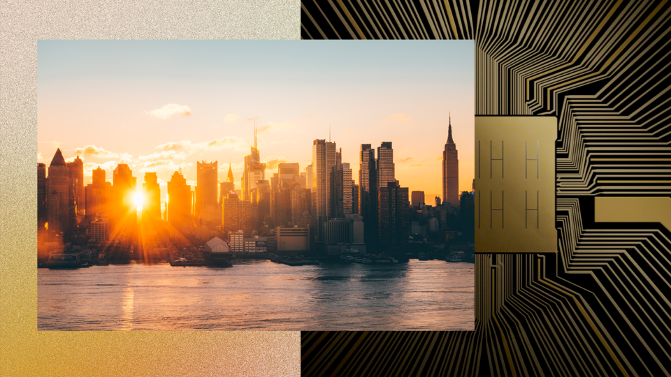 A composite image featuring a city skyline at sunset on the left and a stylized circuit board design on the right. The skyline shows tall buildings with the sun setting behind them, casting an orange glow. The circuit board design is gold and black with intricate patterns, symbolizing the intersection of urban life and technological advancement.